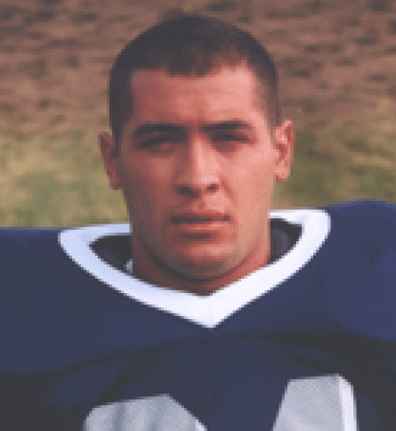 A close up of a football player wearing a uniform