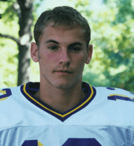 A close up of a football player wearing a uniform