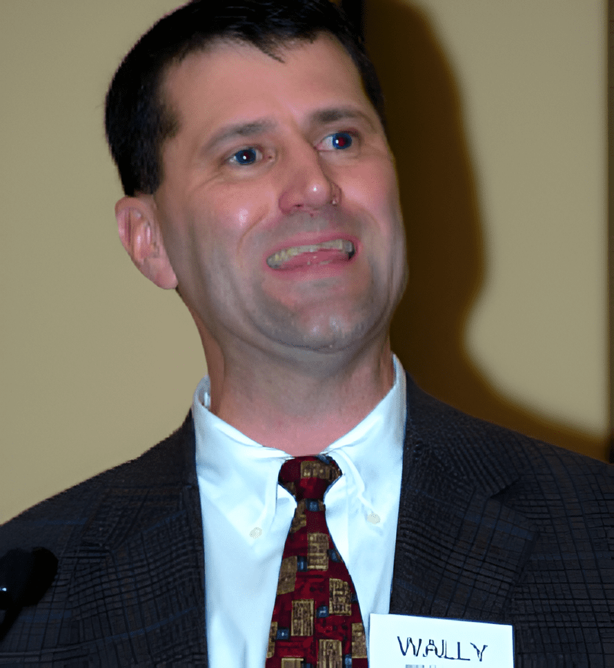 A man in a suit and tie standing at a podium.